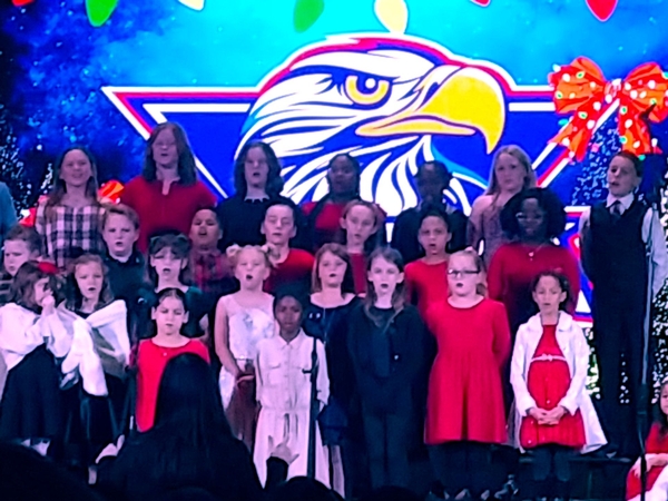 Lower school Soaring Singers choir singing at the Christmas performance