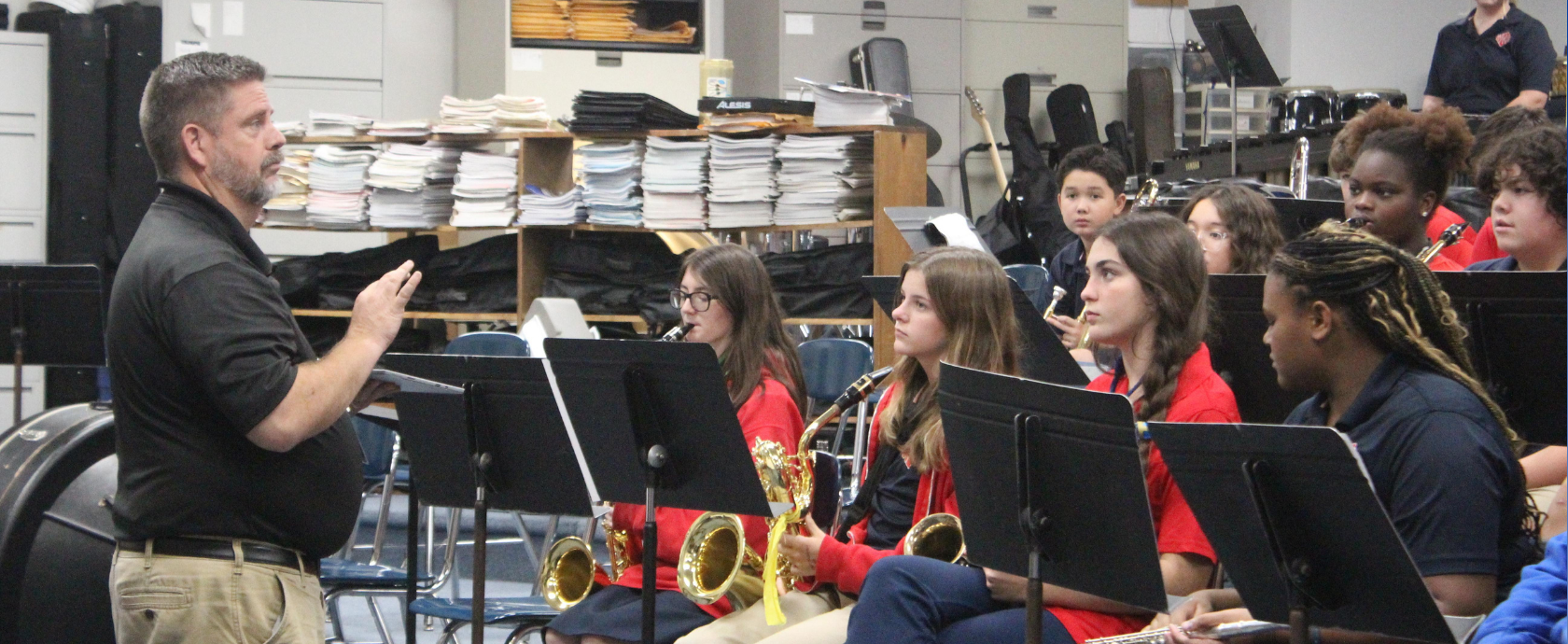 Band teacher teaching middle school students band.  Discovering TRUTH in Fine Arts.