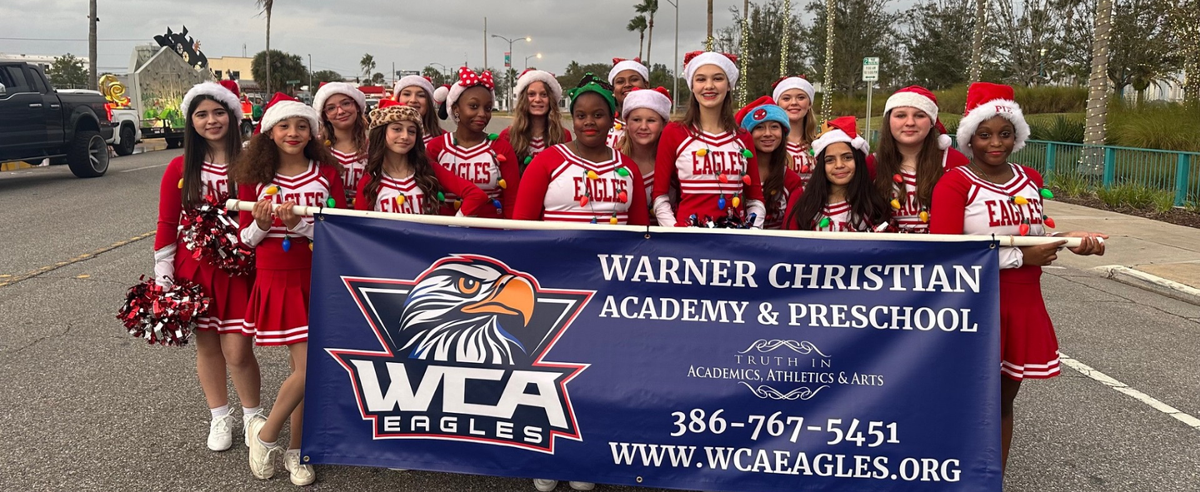 Warner Christian Academy Cheerleaders at the Christmas parade.  Discovering TRUTH in Athletics.